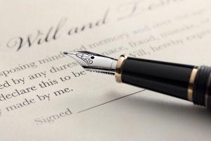 Legal document labeled “Trust Will” placed on a solicitor’s desk