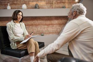 Doctor conducting a mental capacity assessment in the UK with an elderly patient