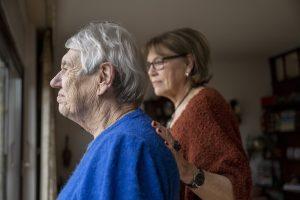 Solicitor guiding a client through writing a will after a dementia diagnosis