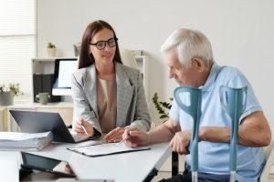 Doctor discussing an advance directive for health with a senior patien